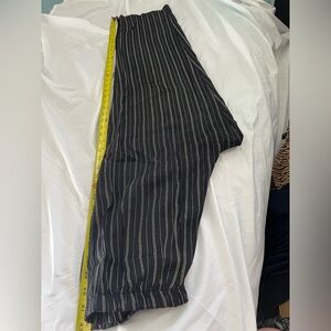 Black striped pants light  polyester. No tags c pics for measurements. K.